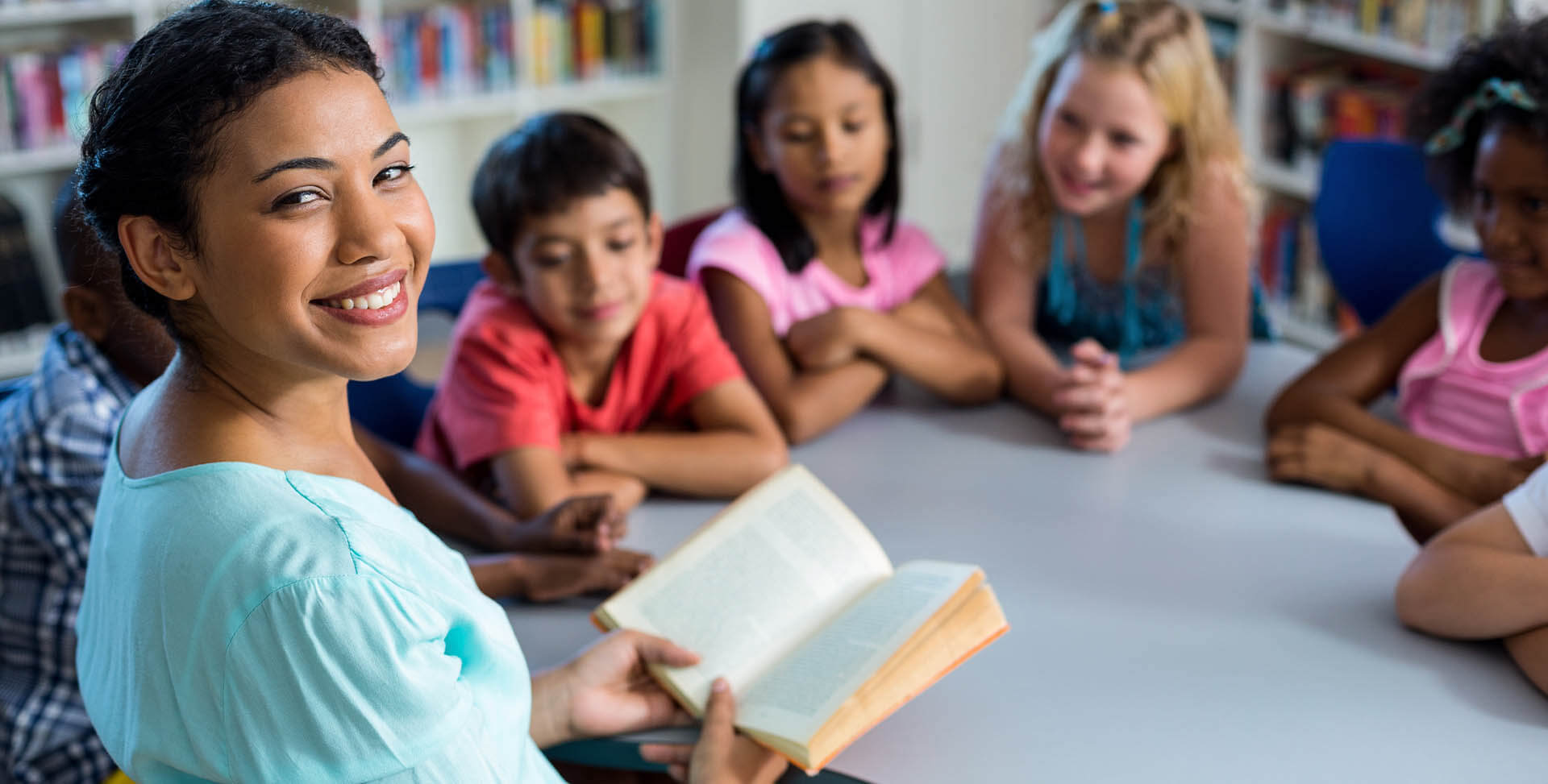 Having taught. Pupils. Teacher reading. School principal woman.